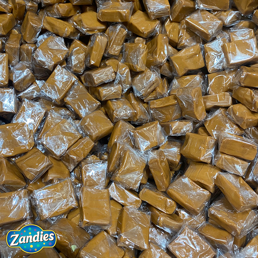 Large bin full of Classic Caramel Candy. Zandies Logo in the bottom corner.