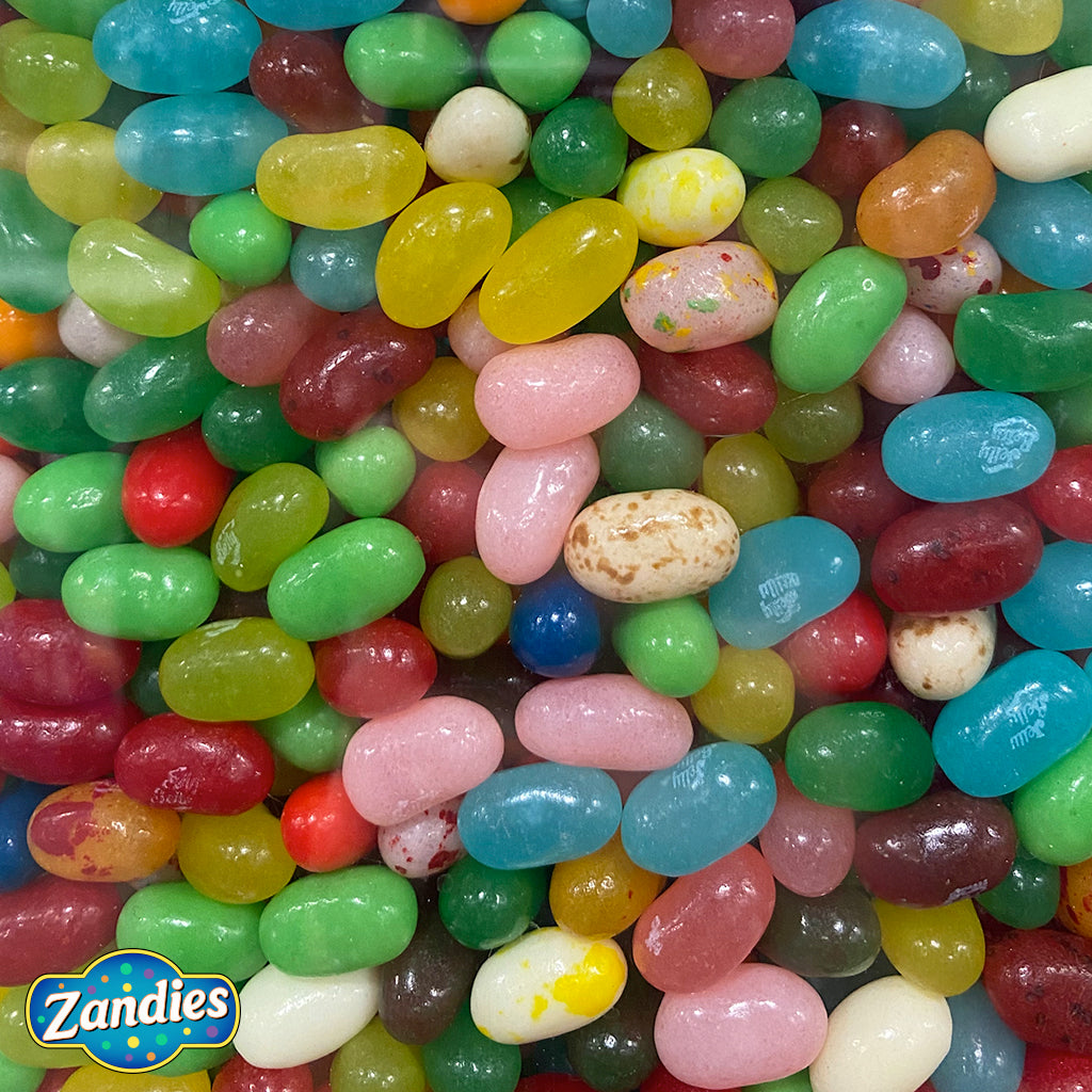 Large pile of Jelly Belly Kids Mix, multiple colors and flavors. Zandies logo in the corner.