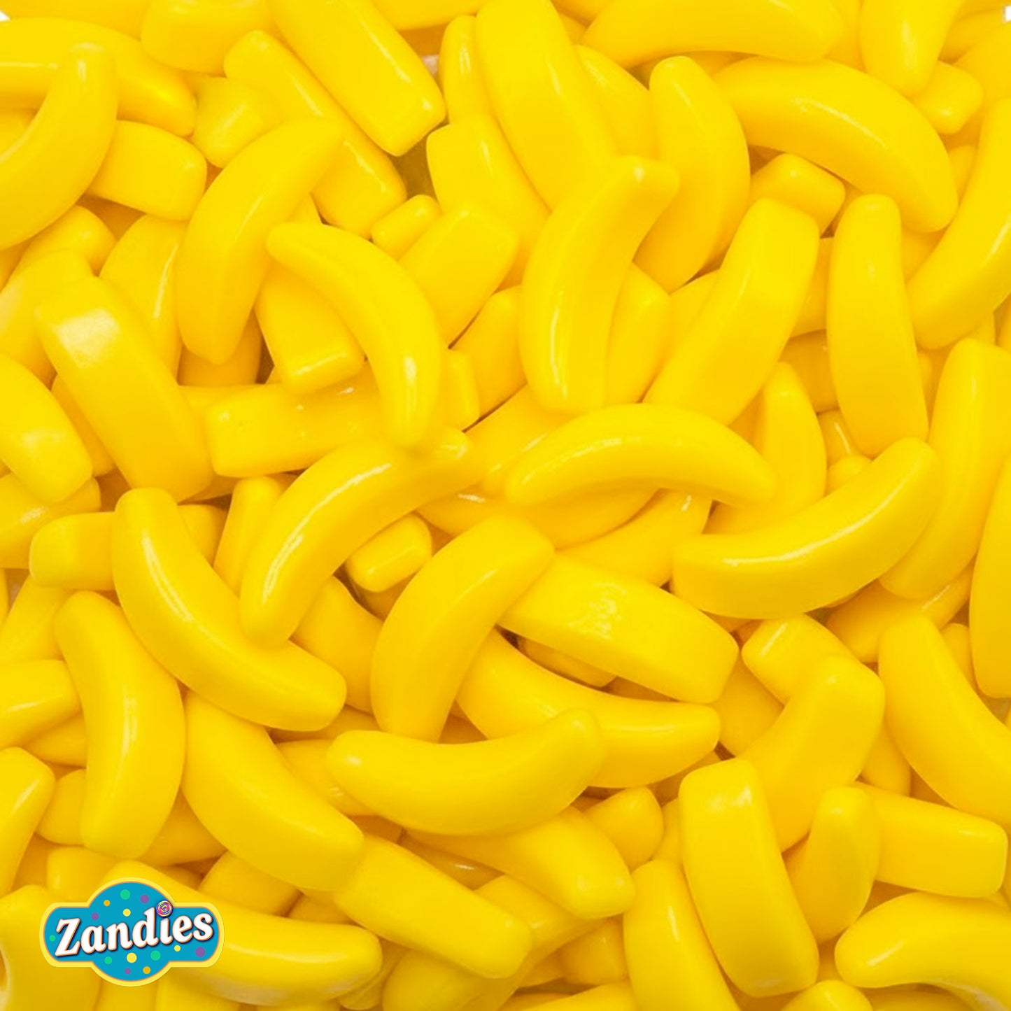 Bright yellow banana-shaped hard candies with banana flavor