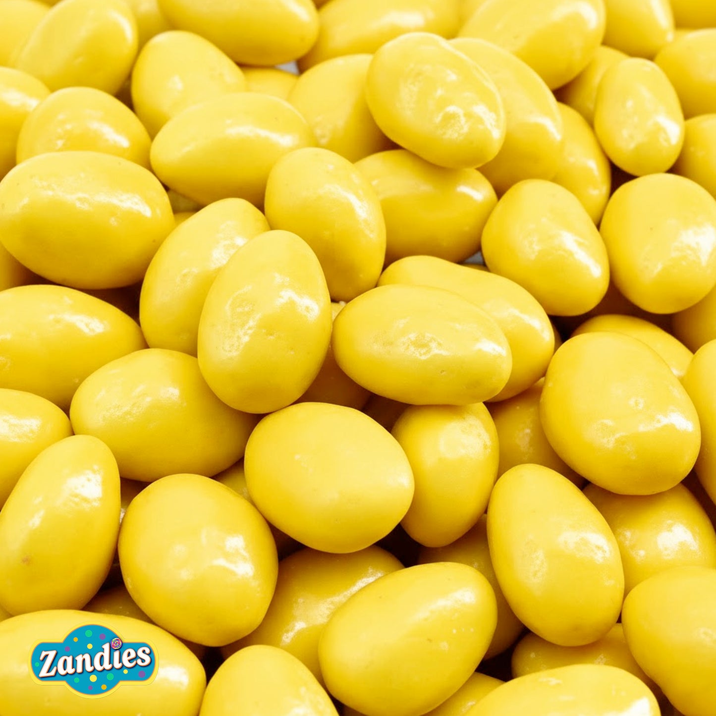 Bulk pile of Lemoncello almonds covered in white chocolate and lemon crème