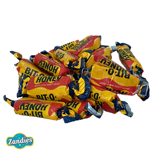Pile of Zandies honeycomb candy wrappers on a white background