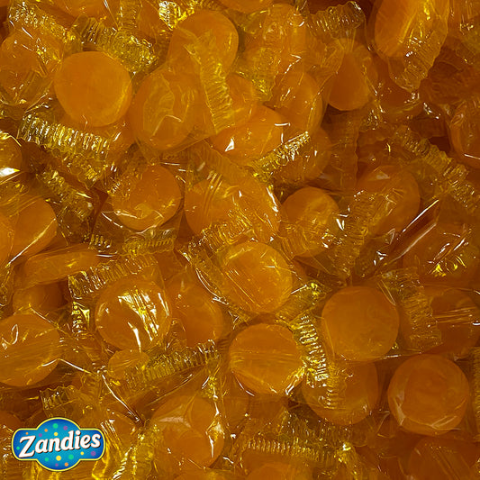 Large pile of individually wrapped Butterscotch disks, bulk 1 pound purchase. Zandies logo in the corner