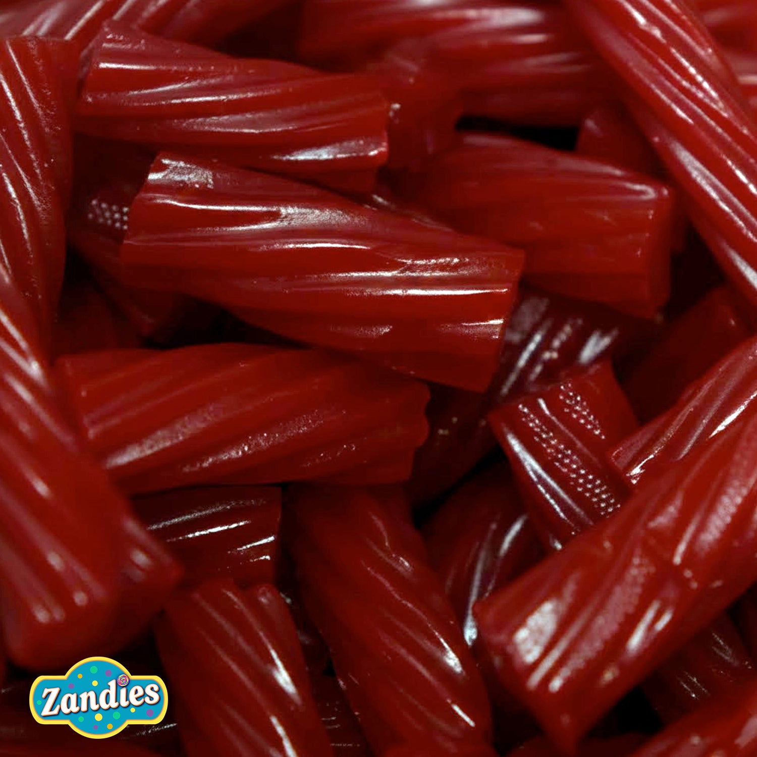 Close-up of red Licorice Pcs Strawberry with Zandies logo.