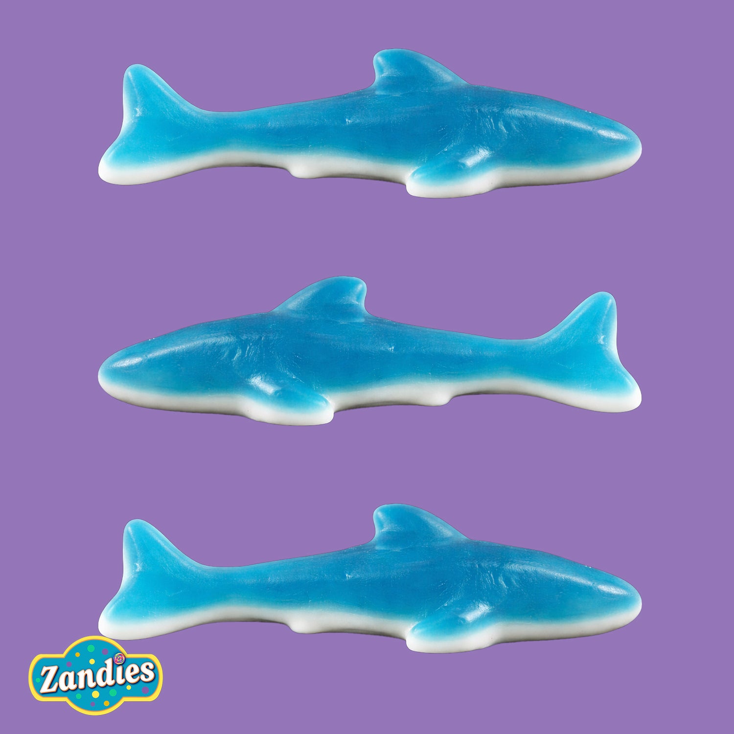 Blue and white gummi shark candy close-up showing fruity texture