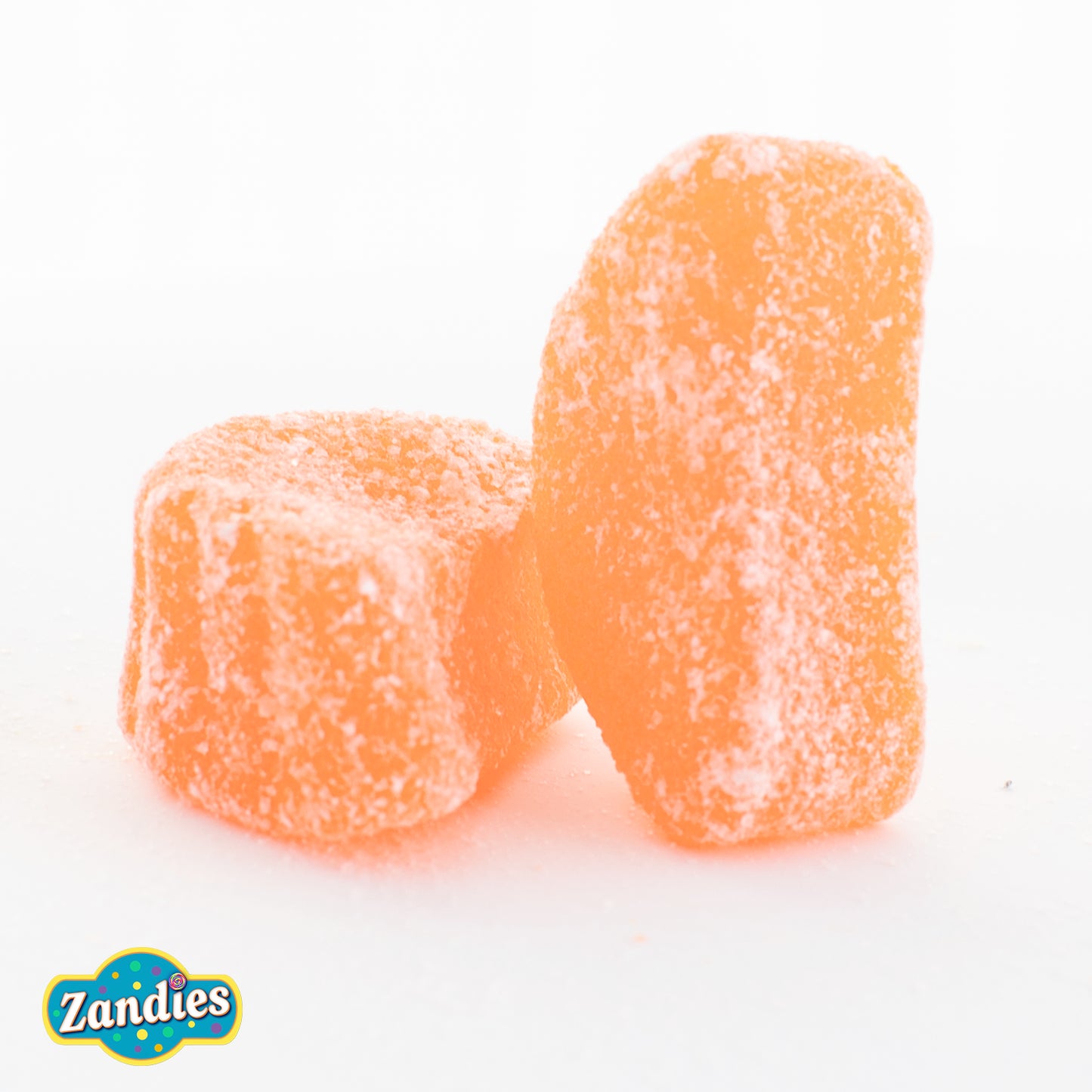 Close-up of gummy orange slices showing sugar coating and orange color