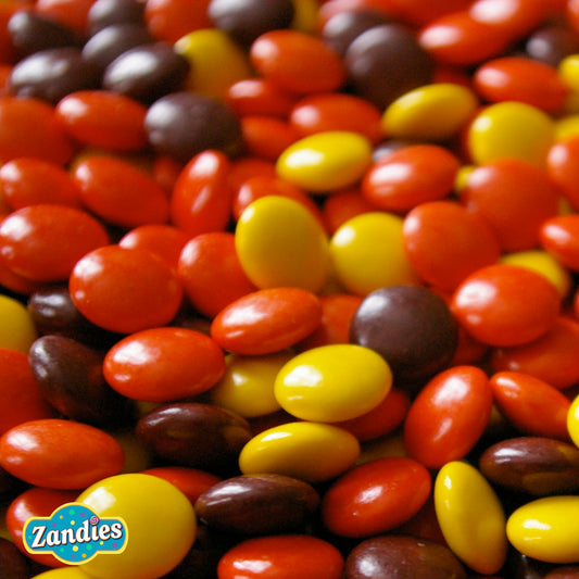 Close-up of colorful candies Hersheys Reeses Pieces with Zandies logo.