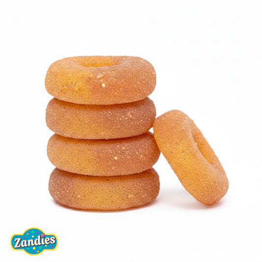 Stack of Spicy Peach Rings Tajin on a white background